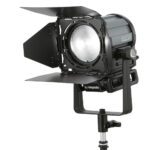 Litepanels - Sola 4+ Daylight Fresnel Front left with barndoor attached