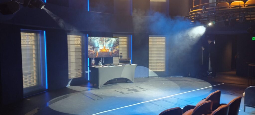 Follow-Me Automated follow spot system Stage lit by manually controlled moving heads