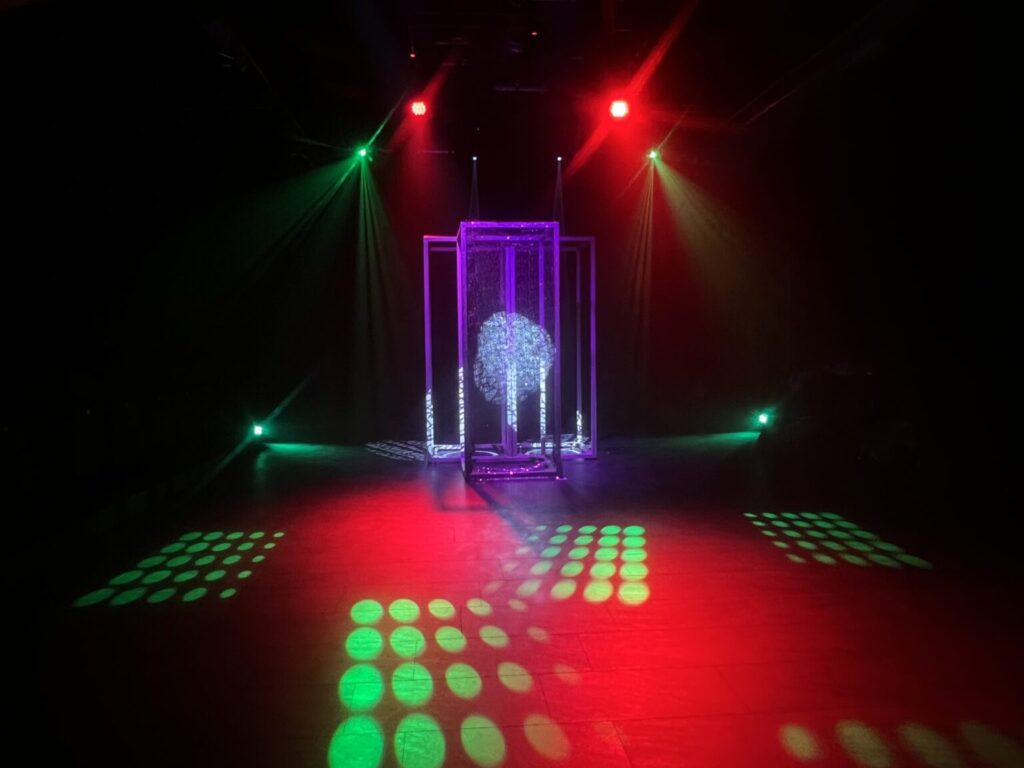 Theatre Space for Salford’s Next Generation Lit with green and red profiles